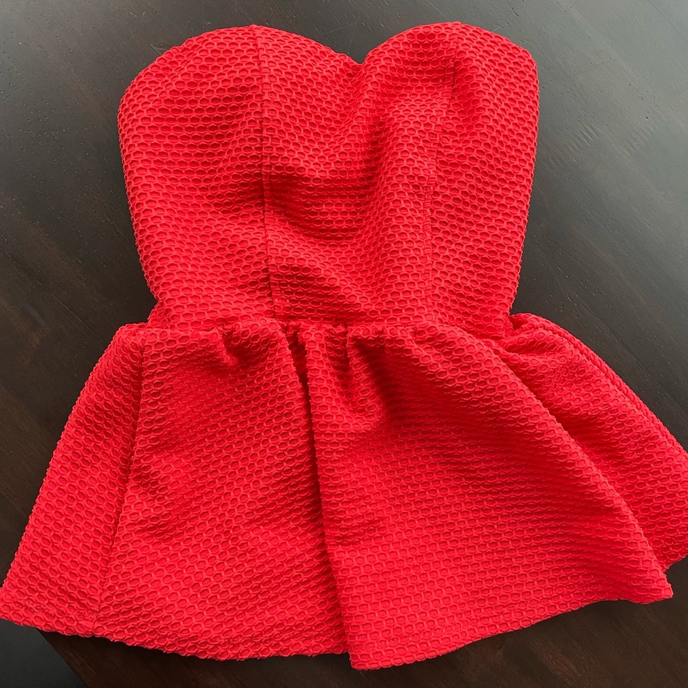 Bright orange peplum strapless top with back detail